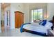 Comfortable main bedroom with sliding glass doors to the outside and a well-lit area at 2877 Paradise Rd # 104, Las Vegas, NV 89109
