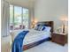 Well-lit main bedroom with a large window, creating a bright and airy space at 2877 Paradise Rd # 104, Las Vegas, NV 89109