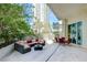 Large patio with comfortable seating and views of high-rise building at 2877 Paradise Rd # 104, Las Vegas, NV 89109