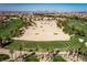 Aerial view of lush green golf course with mature palm trees at 296 Brushy Creek Ave, Las Vegas, NV 89148