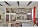 Inviting living room highlighting a stone fireplace, hardwood floors, and comfortable seating at 296 Brushy Creek Ave, Las Vegas, NV 89148