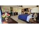 Spacious main bedroom featuring a fireplace, sitting area, and elegant furnishings at 296 Brushy Creek Ave, Las Vegas, NV 89148