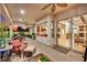 Back patio features views from inside the home, dining, and pool at 296 Brushy Creek Ave, Las Vegas, NV 89148