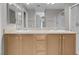 Bathroom featuring a dual sink vanity with stone countertop at 3097 Quail Crest Ave, Henderson, NV 89052