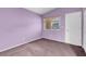Bedroom featuring neutral carpet and a window with blinds at 3097 Quail Crest Ave, Henderson, NV 89052