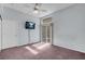Spacious bedroom with sliding door and TV at 3097 Quail Crest Ave, Henderson, NV 89052