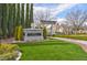 Well-maintained community entrance with manicured landscaping and stately signage at 3097 Quail Crest Ave, Henderson, NV 89052