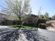 Charming single-story home featuring a well-manicured front yard and a two-car garage at 32 Feather Sound Dr, Henderson, NV 89052