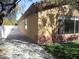 Home exterior shows artificial grass, desert landscaping, and a long, paved walkway at 32 Feather Sound Dr, Henderson, NV 89052