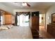 Bedroom with wood floors and access to the outside, with a large window and closet at 325 Wild Plum Ln, Las Vegas, NV 89107