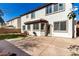 Backyard with a spacious concrete patio and small patch of artificial turf, suitable for relaxing or entertaining at 3305 Alcudia Bay Ave, Las Vegas, NV 89141