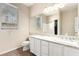 Bathroom with dual sinks, a granite countertop, and a shower/tub combo at 3305 Alcudia Bay Ave, Las Vegas, NV 89141