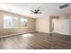 Large bedroom featuring hardwood floors, neutral walls, and natural light at 3305 Alcudia Bay Ave, Las Vegas, NV 89141