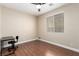Bedroom featuring wood-look flooring, a ceiling fan, and window with a view at 3305 Alcudia Bay Ave, Las Vegas, NV 89141