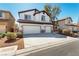 Two-story home featuring a double garage, inviting curb appeal, and located in a well-kept neighborhood at 3305 Alcudia Bay Ave, Las Vegas, NV 89141