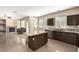 Kitchen and Living Room combo with stainless steel appliances and tiled floors at 3305 Alcudia Bay Ave, Las Vegas, NV 89141