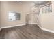 Bright living room with soaring ceilings and luxury vinyl plank flooring at 3305 Alcudia Bay Ave, Las Vegas, NV 89141