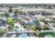 Resort style backyard with an in-ground pool, beautiful landscaping, and mountain views at 3365 Badura Ave, Las Vegas, NV 89118
