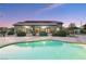 Home with solar panels, gorgeous landscaping, and a large pristine pool at 3365 Badura Ave, Las Vegas, NV 89118
