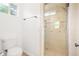 This is a pristine bathroom featuring a shower with glass door and patterned tile at 3365 Badura Ave, Las Vegas, NV 89118