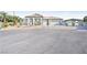Charming single story home with desert landscaping, a three-car garage, and covered parking at 3365 Badura Ave, Las Vegas, NV 89118