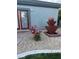 A beautifully landscaped backyard showcasing decorative stone and water feature near the house at 3365 Badura Ave, Las Vegas, NV 89118