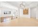 Open concept living space with tile floors, stone accents, and natural lighting at 3365 Badura Ave, Las Vegas, NV 89118
