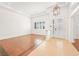 Bright living room with hardwood floors, large windows, and elegant lighting at 3365 Badura Ave, Las Vegas, NV 89118