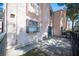 Exterior backyard featuring a stone patio and fencing at 3369 Milenko Dr, Las Vegas, NV 89121