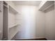 A well-organized closet with multiple shelves and hanging rods, perfect for maximizing storage space and keeping items tidy at 3369 Milenko Dr, Las Vegas, NV 89121
