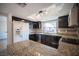 Kitchen featuring granite countertops and tiled floors at 3369 Milenko Dr, Las Vegas, NV 89121
