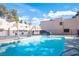Relaxing community pool area with lounge chairs for residents and guests to enjoy at 3369 Milenko Dr, Las Vegas, NV 89121