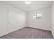 Carpeted bedroom with natural light and closet space at 3588 Franciscan Ln, Las Vegas, NV 89121