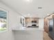 Bright kitchen with stainless steel appliances, an island, and lots of cabinets at 3588 Franciscan Ln, Las Vegas, NV 89121