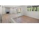 Upstairs living area with wood floors, a fireplace, and sliding doors at 3588 Franciscan Ln, Las Vegas, NV 89121