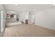 Open-concept living area with light wood floors and ample natural light at 3588 Franciscan Ln, Las Vegas, NV 89121