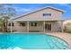 The backyard features a large pool, patio, and covered veranda, perfect for outdoor living at 3588 Franciscan Ln, Las Vegas, NV 89121