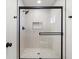 Walk-in shower featuring sleek black trim and fixtures at 3588 Franciscan Ln, Las Vegas, NV 89121