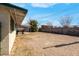 Spacious backyard with a covered patio area, perfect for outdoor activities at 3709 Perliter Ave, North Las Vegas, NV 89030