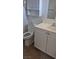 Bathroom with a white vanity, toilet, and tiled floor at 3709 Perliter Ave, North Las Vegas, NV 89030