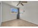 Empty bedroom with tile floors and a window at 3709 Perliter Ave, North Las Vegas, NV 89030