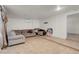 Open living room features tile floors and neutral paint at 3709 Perliter Ave, North Las Vegas, NV 89030