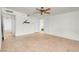 Living room with neutral tile floors and multiple doorways at 3709 Perliter Ave, North Las Vegas, NV 89030