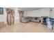 Open living room features tile floors and neutral paint at 3709 Perliter Ave, North Las Vegas, NV 89030