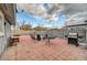 Outdoor patio seating area with grill, ready for entertaining and enjoying backyard at 4102 Calimesa St, Las Vegas, NV 89115