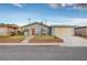 Charming single-story home with a well-maintained front yard and attached garage at 4102 Calimesa St, Las Vegas, NV 89115