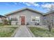 Front view of a quaint single-story home with a neat lawn and tidy landscaping at 4102 Calimesa St, Las Vegas, NV 89115