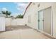 Back patio boasts both hardscape and concrete, with sliding door access and perimeter wall at 430 Nancy Dr, Henderson, NV 89015