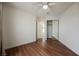 Neutral bedroom with wood-look floors, ceiling fan, and closet at 430 Nancy Dr, Henderson, NV 89015