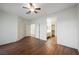 Open bedroom with wood-look floors and natural lighting at 430 Nancy Dr, Henderson, NV 89015